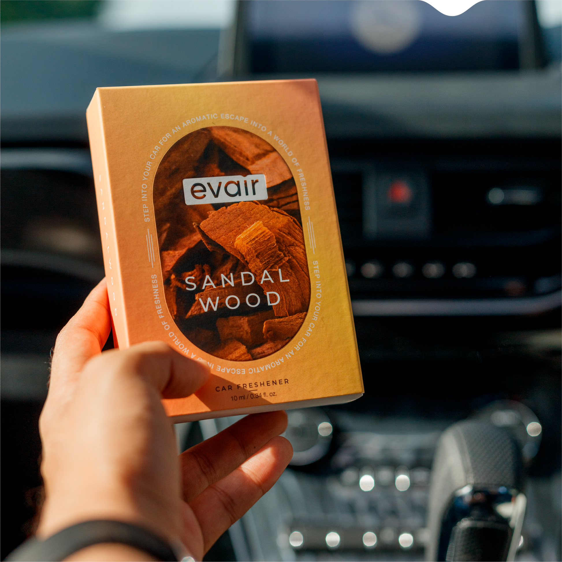 Men Holding Evair Sandalwood Long lasting Car  Perfume in car