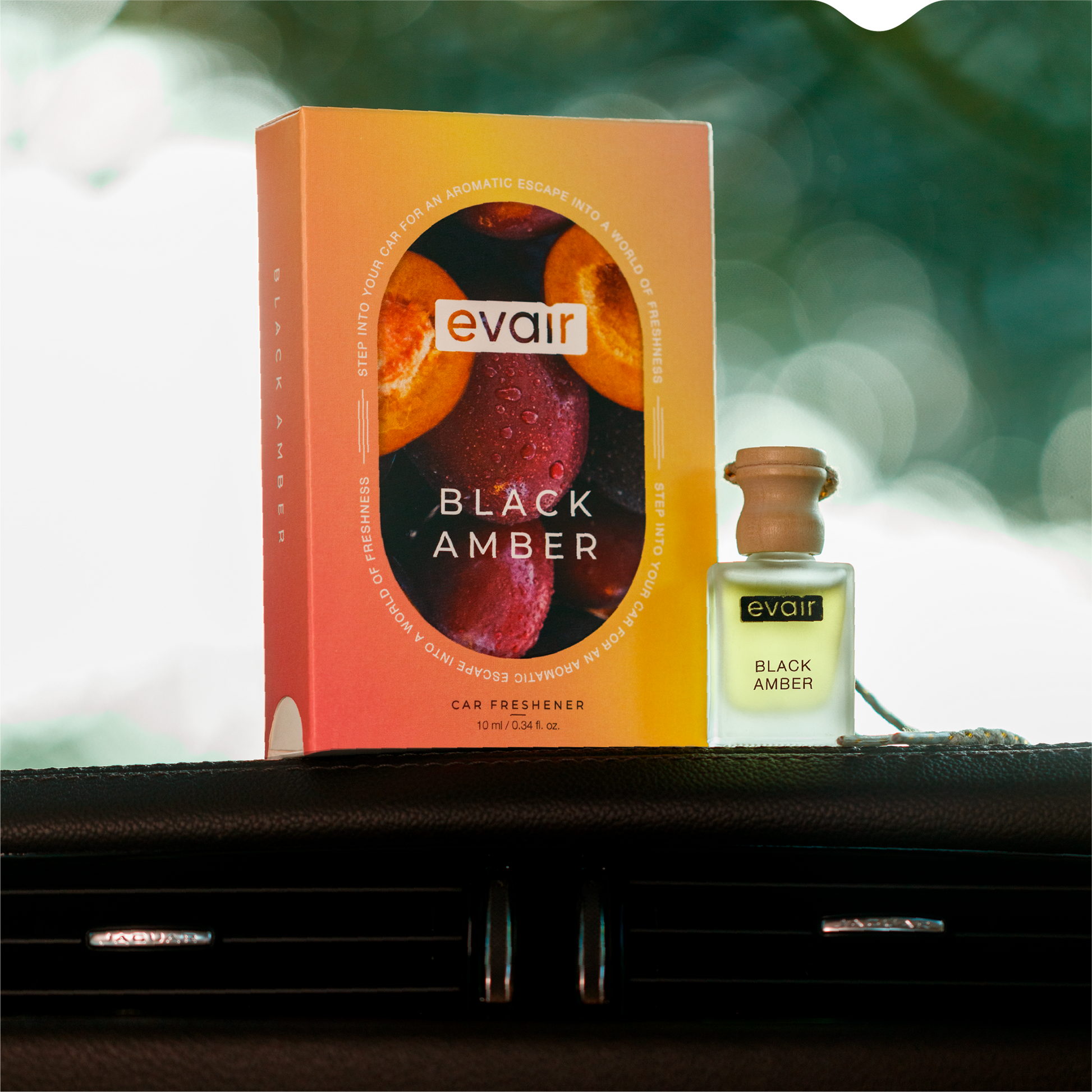 Evair Amber Long lasting Car Perfume box and glass bottle in the car